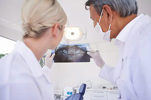 dentist with dental nurse